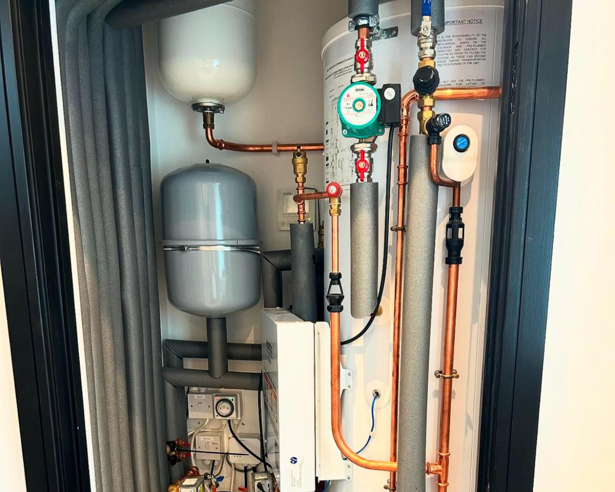 New build plumbing and heating cylinder cupboard in Essex by Plumbers ESX