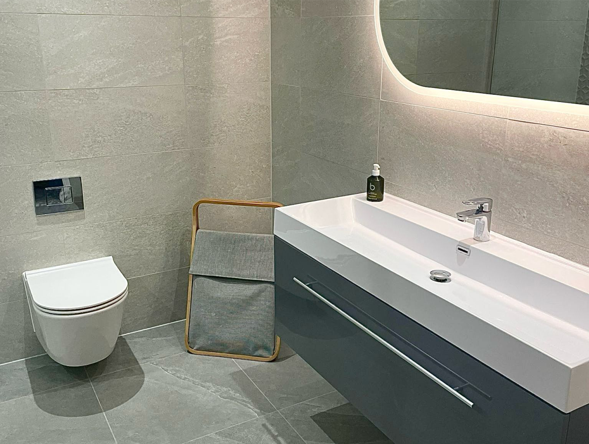 Large basin and wall hung toilet bathroom installation near Haverhill, Essex