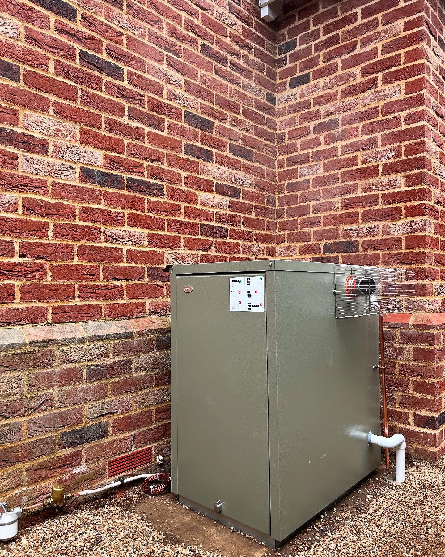 External oil boiler installation against brickwork in Burnham-on-Crouch, Essex