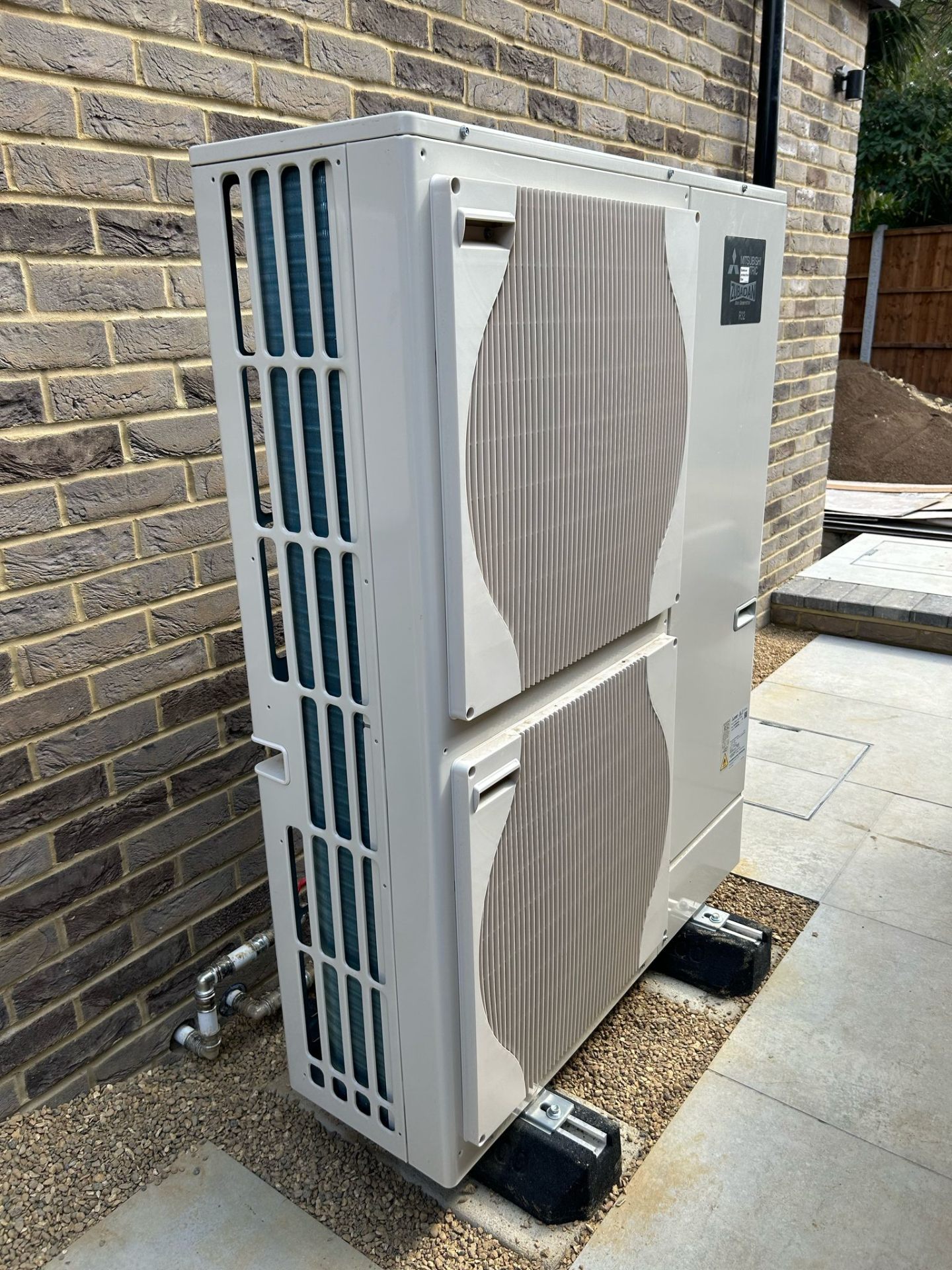Mitsubishi Ecodan outdoor heat pump unit installation in Essex